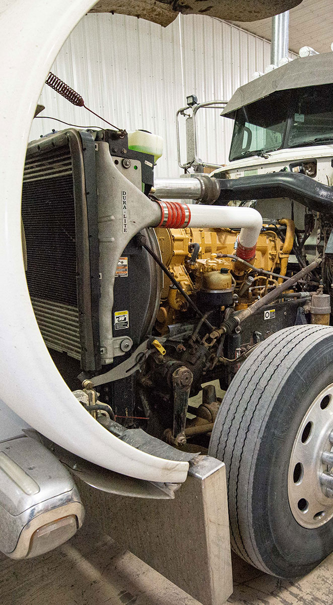 Working on semi truck engine